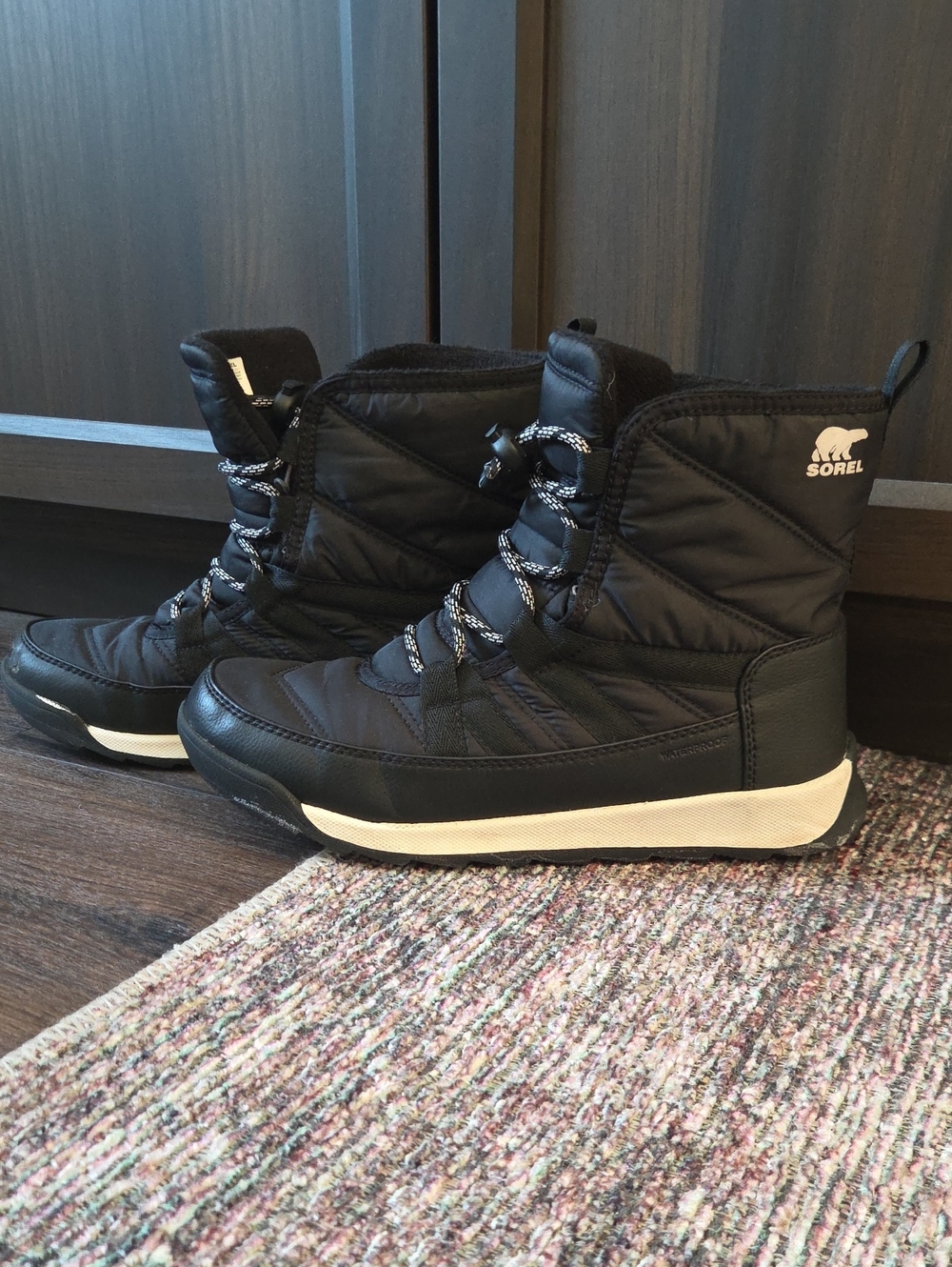 Sorel Black Kids Quilted Winter Ankle Boots with White Sole